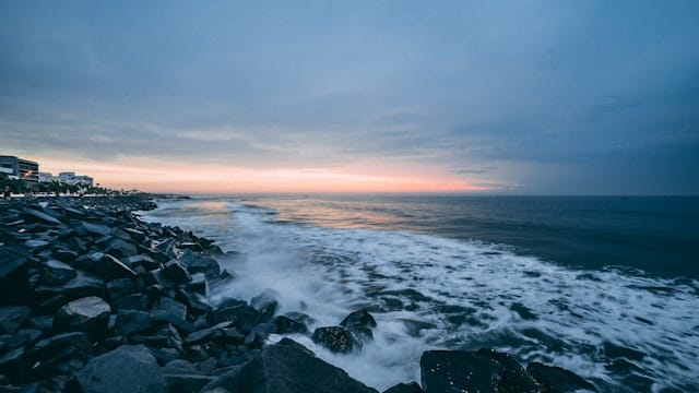 Ocean waves and coastal landscape representing the importance of marine conservation and World Oceans Day awareness
